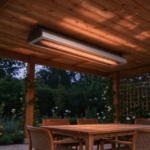 Ceiling heater glowing softly at dusk above a dining table